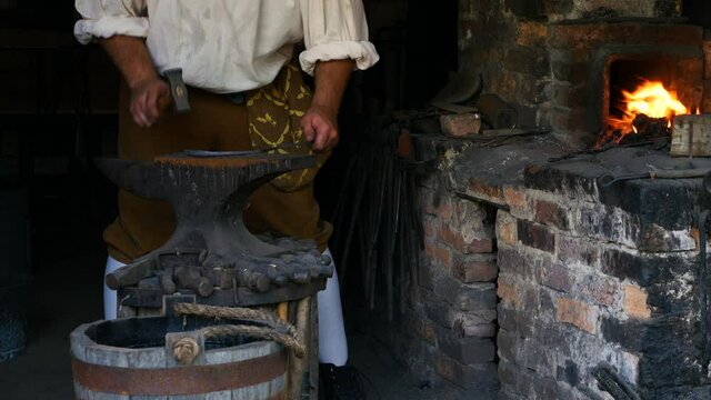 1700s Blacksmith making S hook 2
