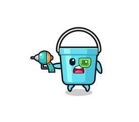 cute plastic bucket holding a future gun.