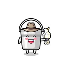 metal bucket zookeeper mascot with a parrot