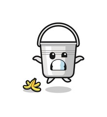 metal bucket cartoon is slip on a banana peel