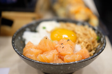 Japanese rice with fresh salmon raw, and egg (salmon don)