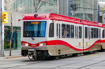 Naklejka na ściany i meble The C-train is Calgary's main light rail transit vehicle and moves over 300,000 people a day.