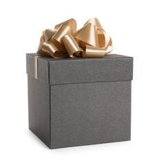 Black gift box with golden bow on white background