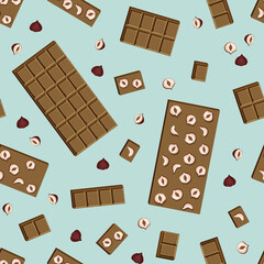 Vector seamless pattern handmade milk chocolate bar with hazelnuts and pieces isolated on blue background.
