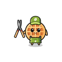 Obraz premium cute circle waffle as gardener mascot