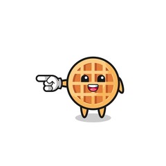 circle waffle cartoon with pointing left gesture