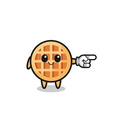 circle waffle mascot with pointing right gesture