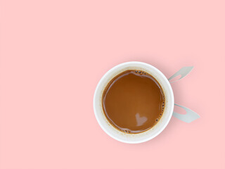 mini heart reflecting on coffee in take away cup isolated on pastel pink