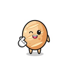 french bread character doing Korean finger heart