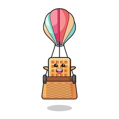 waffle mascot riding a hot air balloon