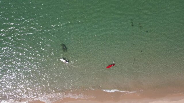 Aerial view, Summer colorful seascape with three boat with torist and tropical beach. Beautiful paradise in sandy seaside. Peaceful andaman Movement camera is zoom out