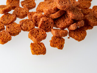 a piece of brown bread cookies on a white background