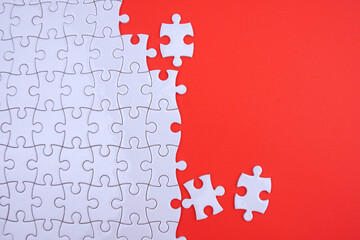 Conceptual photo of copyspace red background missing jigsaw puzzle. Image for motivation, inspiration and consultation, ideation concept