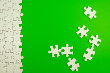 Conceptual photo of copyspace green background missing jigsaw puzzle. Image for motivation, inspiration and consultation, ideation concept