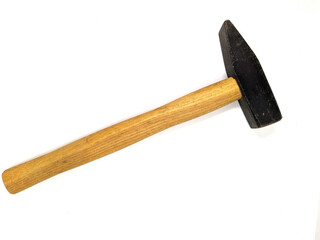 old hammer on white background closeup photo.
