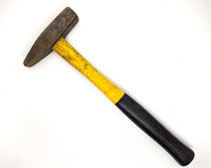 old hammer on white background closeup photo.