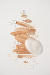 Collection of cosmetic cream isolated on white background. Skincare foam smudge. Cosmetic BB makeup swatch. Drop of liquid skin care oil. Skin tone CC cream tear shape