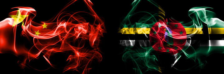 Flags of China, Chinese vs Dominica, Dominican. Smoke flag placed side by side on black background.