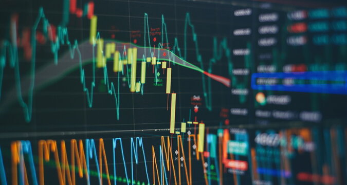 Technical price graph and indicator, red and green candlestick chart on blue theme screen, market volatility, up and down trend. Stock trading, crypto currency background.