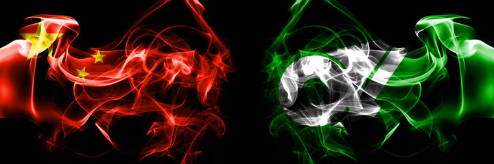 Fototapeta premium Flags of China, Chinese vs Japan, Japanese, Mie Prefecture. Smoke flag placed side by side on black background.