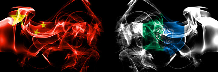 Flags of China, Chinese vs Japan, Japanese, Sapporo, Hokkaido. Smoke flag placed side by side on black background.