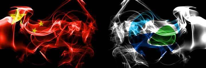Flags of China, Chinese vs Japan, Japanese, Toyako, Hokkaido. Smoke flag placed side by side on black background.