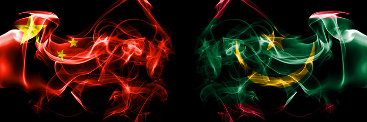Flags of China, Chinese vs Mauritania. Smoke flag placed side by side on black background.