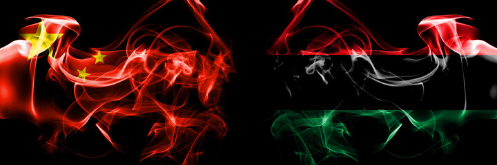 Flags of China, Chinese vs Organizations, Pan african, UNIA. Smoke flag placed side by side on black background.