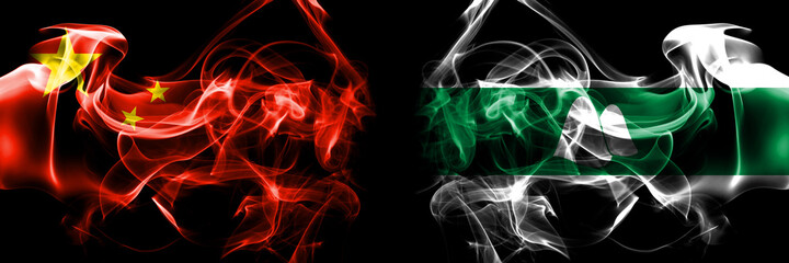 Fototapeta premium Flags of China, Chinese vs Russia, Russian, Kurgan Oblast. Smoke flag placed side by side on black background.