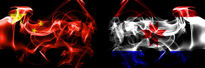 Flags of China, Chinese vs Russia, Russian, Mordovia. Smoke flag placed side by side on black background.