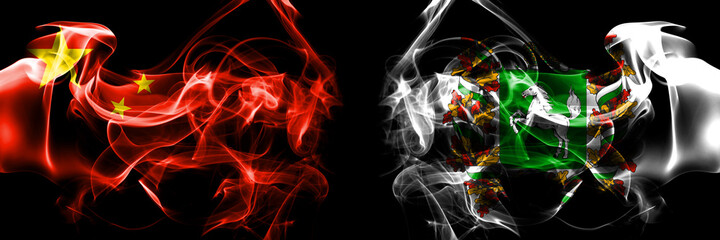 Fototapeta premium Flags of China, Chinese vs Russia, Russian, Tomsk Oblast. Smoke flag placed side by side on black background.