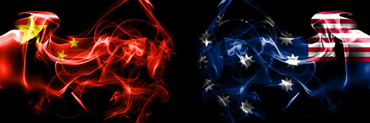 Flags of China, Chinese vs United States of America, America, US, USA, American, Easton, Pennsylvania. Smoke flag placed side by side on black background.