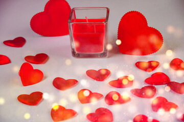 White background with red skrdechki, candles. Valentine's Day concept. Valentine's Day banner. Valentine's day background.