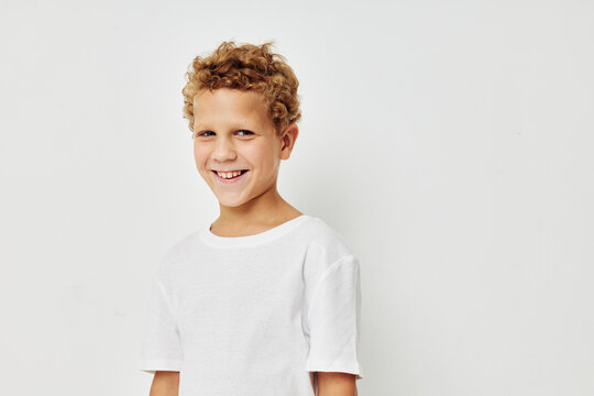 Cute little boy smile in white t-shirt childhood unaltered