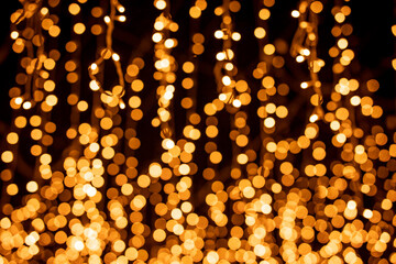 Abstract bokeh lights.
Bokeh blur of lights at night. Bright blue, gold, white glow circle background for festive, Christmas, and new year. with copy 