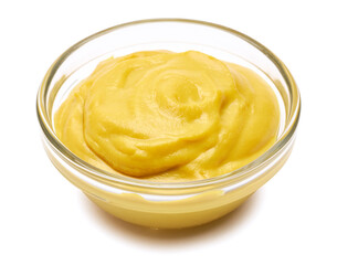 Classic mustard sauce in glass bowl isolated on white background