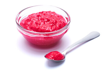 Horseradish red sauce in glass bowl isolated on white