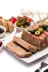 Traditional French terrine covered with bacon isolated on white background