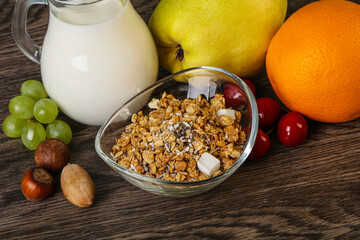 Breakfast with granola and milk