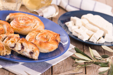 Pastry swirls with cheese and olive filling.
