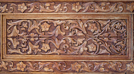 Wooden sculpture with floral motifs on the door of Sihla Monastery - Romania