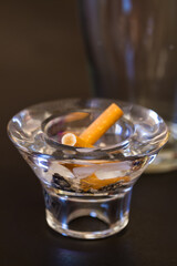 Cigarette butts in ashtray