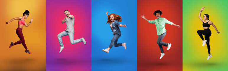 Happy inrerracial millennial people fooling together, jumping in air on bright color studio...