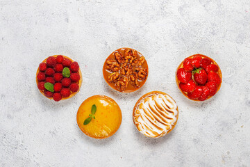 Assortment of crispy tartlet with filling.
