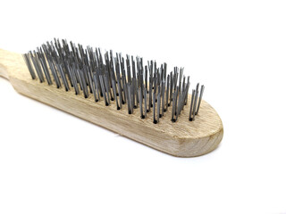 new metal wire brush with wooden handle for cleaning on a white background.