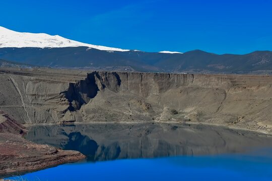 Crater flooded with water in the Alquife Mines in Granada,
