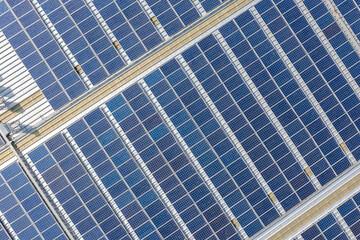Obraz premium solar power station on factory rooftop
