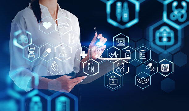 Businesswoman wearing white shirt is taking notes in notebook