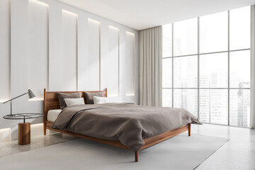 White bedroom interior with bed on carpet, grey concrete floor, panoramic window
