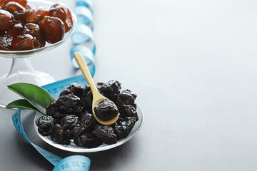Healthy foods. Dried fruits for diet. Prunes, dates, raisins and figs. Healthy and proper nutrition for life.